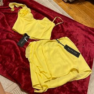 White fox yellow two piece top and short skirt
